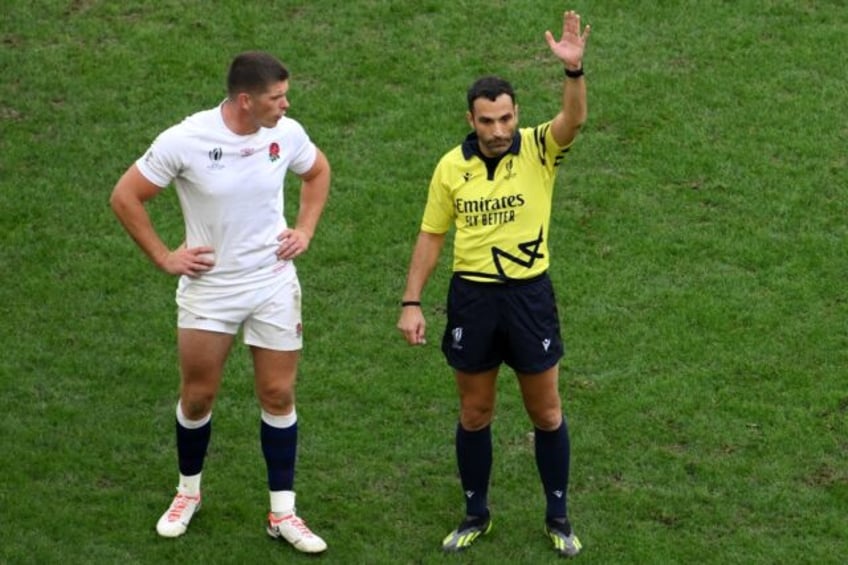 Mathieu Raynal (R) refereed the 2023 Rugby World Cup quarter-final between England and Fij