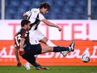 Revived Vlahovic shoots Juve top with double at fan-less Genoa