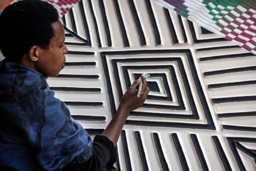 Imigongo art is known for its raised black and white patterns