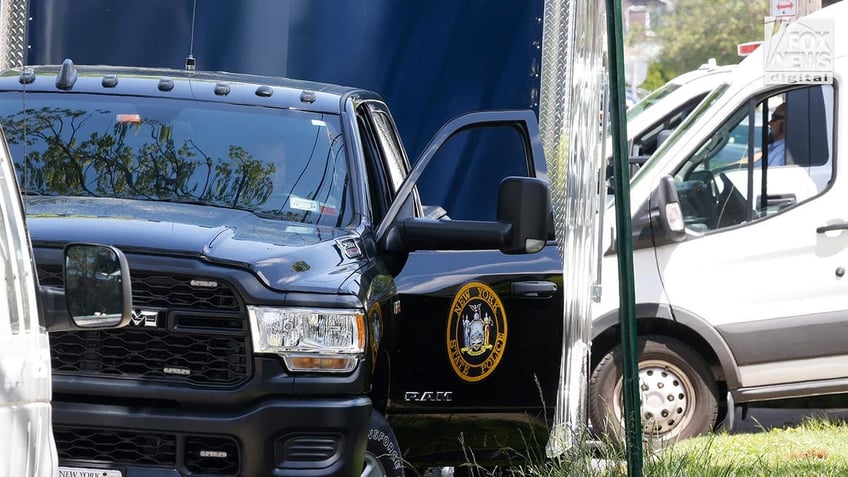 Police outside of a suburban home