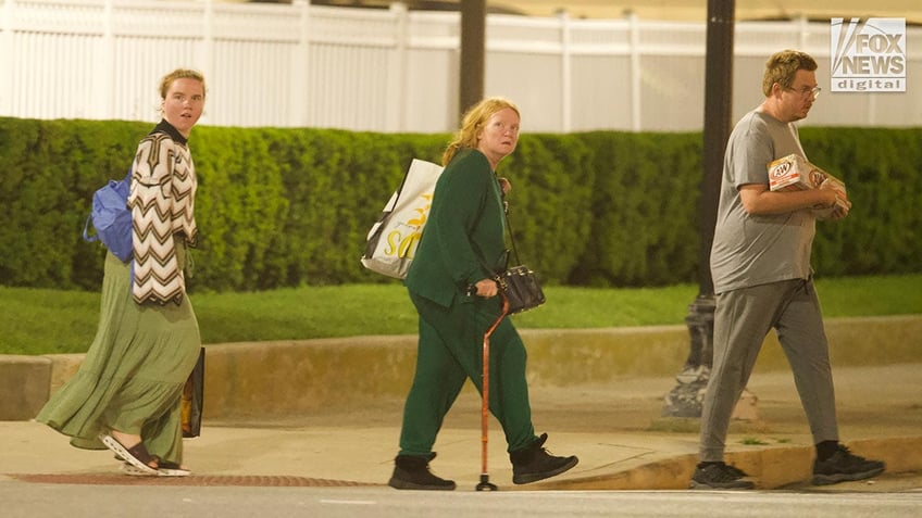 rex heuermanns wife pictured for first time as she files for divorce from gilgo beach serial slaying suspect