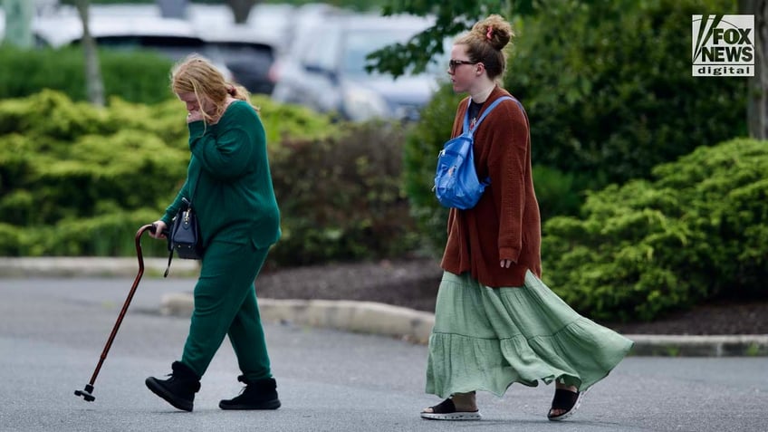rex heuermanns wife pictured for first time as she files for divorce from gilgo beach serial slaying suspect