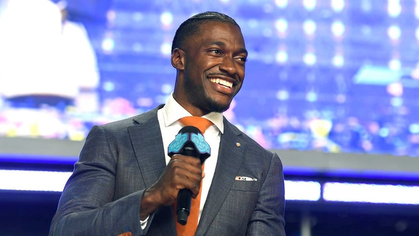 rg3 makes reference to jesus being on the cross during lsu ole miss football game broadcast