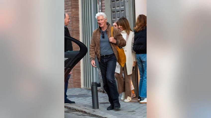 Richard Gere and Alejandra Silva leaving their home in Madrid