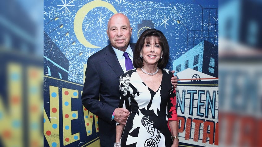 Richard Leibner and his wife pose on the red carpet.