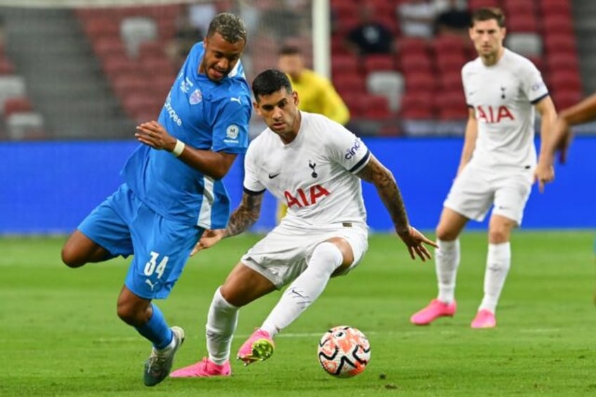 richarlison hat trick seals tottenham win in singapore