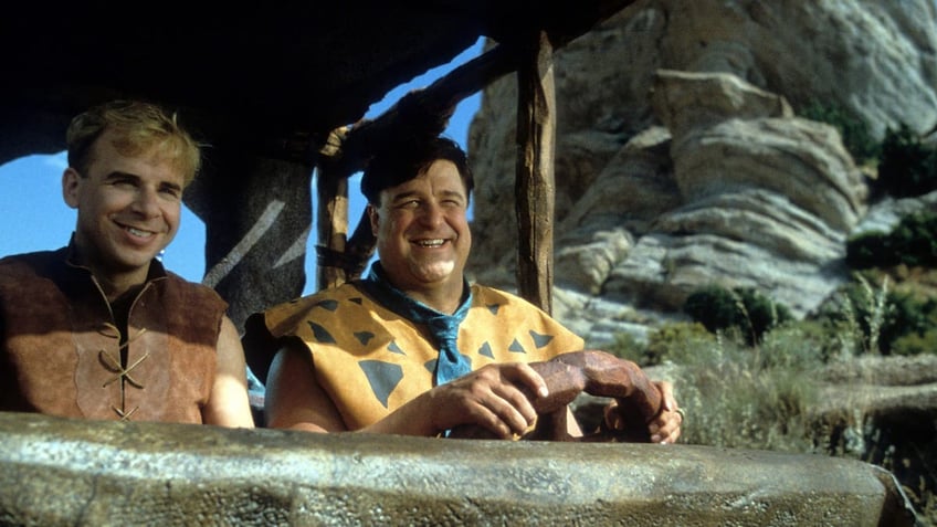 Rick Moranis and John Goodman in "The Flinstones"