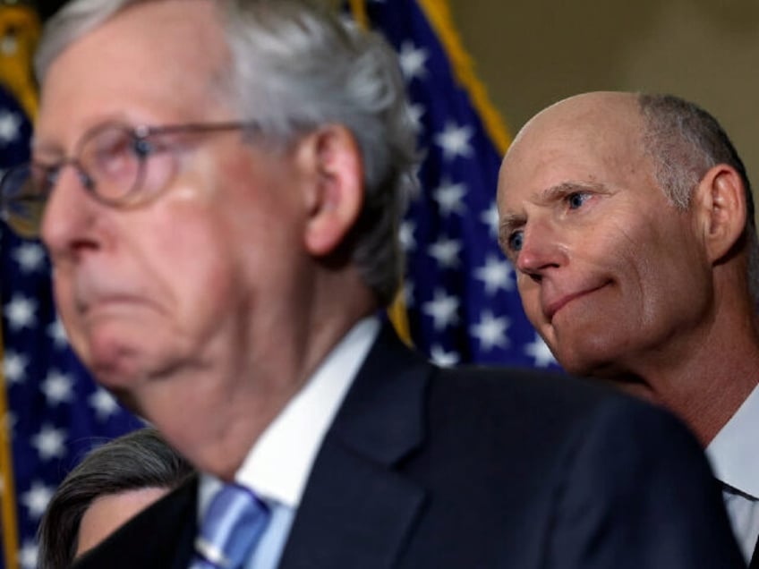 WASHINGTON, DC - SEPTEMBER 07: Sen. Rick Scott (R-FL) and Senate Minority Leader Mitch McC