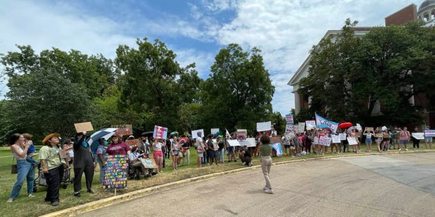 riley gaines activists say they were spat on attacked by protesters at ceremonial bill signing in texas