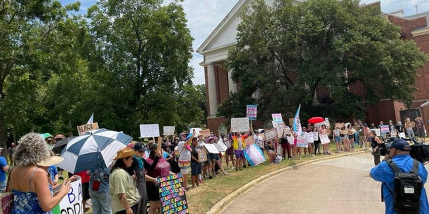 riley gaines activists say they were spat on attacked by protesters at ceremonial bill signing in texas