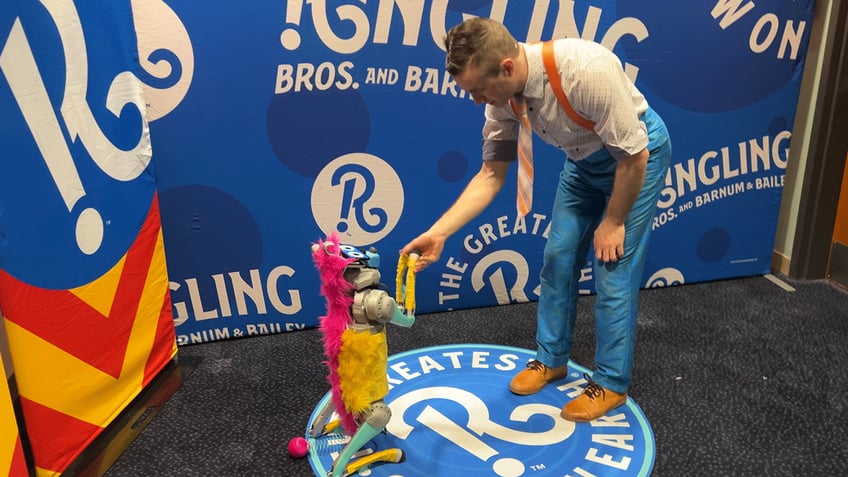 Nick Nack and robo dog Bailey of Ringling Bros. and Barnum & Bailey