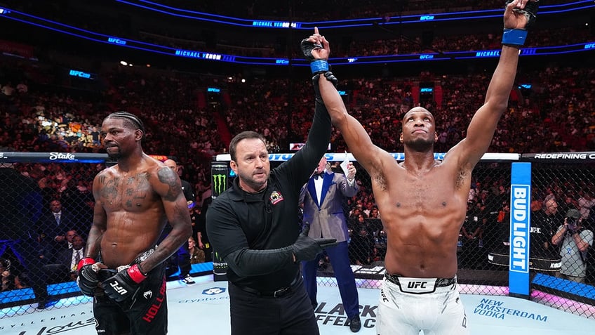 Michael Page reacts to being named winner of fight