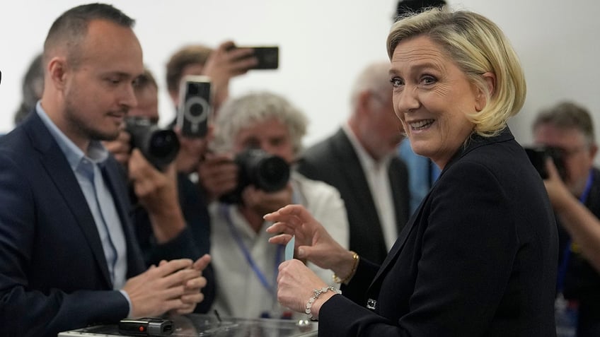 Marine Le Pen casts ballot