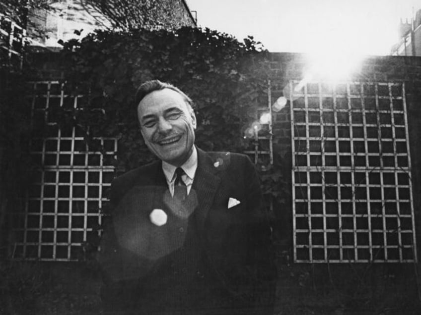 British Conservative Party politician Enoch Powell (1912 - 1998) at home, UK, circa 1965.