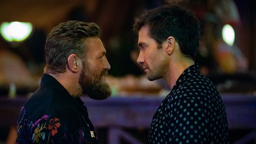 Conor McGregor and Jake Gyllenhaal face to face in a scene from Road House