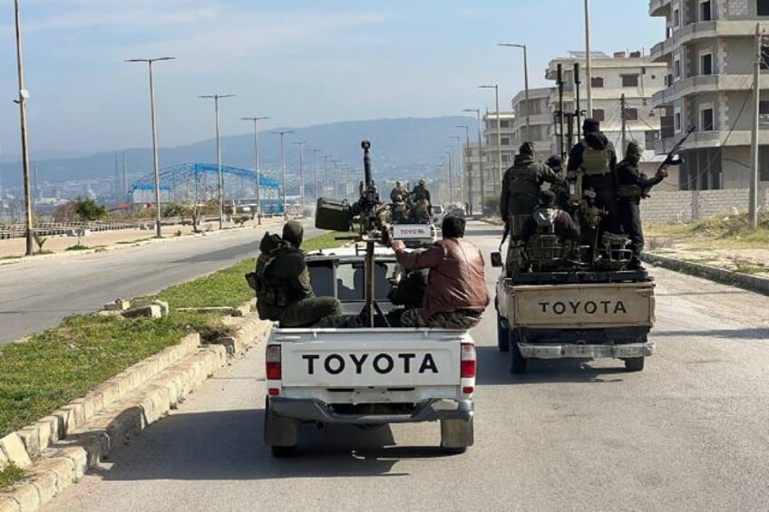 A SANA picture shows Syrian security forces entering Baniyas on March 7