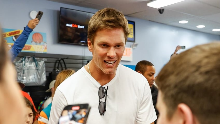 Tom Brady interacts with kids