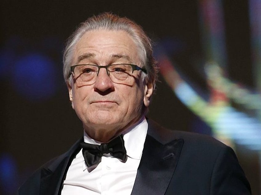 Robert De Niro poses for photographers after receiving a tribute to his contribution to acting, during the 17th Marrakech International Film Festival in Marrakech, Morocco, Saturday, Dec. 1, 2018. The festival runs from Nov. 30 - Dec. 8. (AP Photo/Abdeljalil Bounhar)