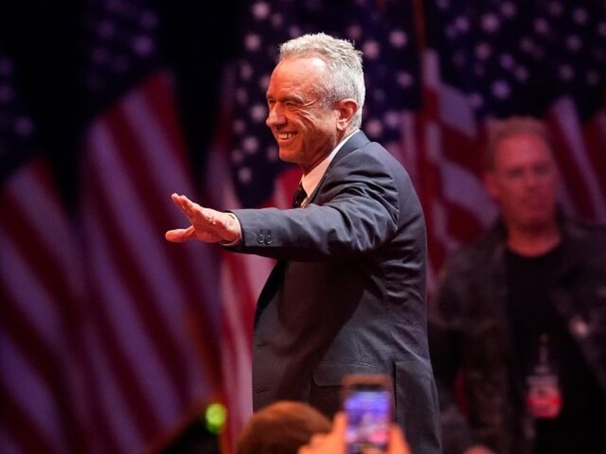 Robert F. Kennedy Jr., waves before Republican presidential nominee former President Donal