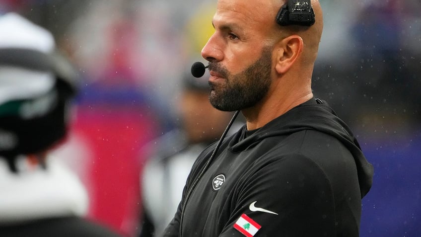 Robert Saleh with Lebanon flag on sweatshirt