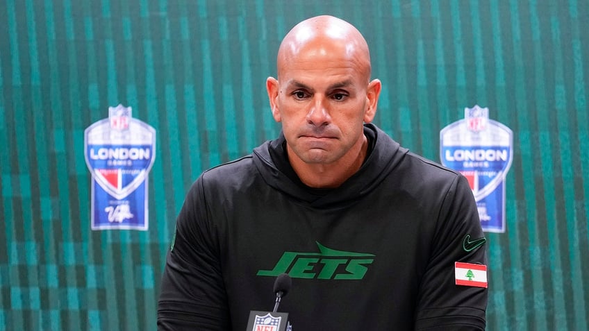 Robert Saleh at podium