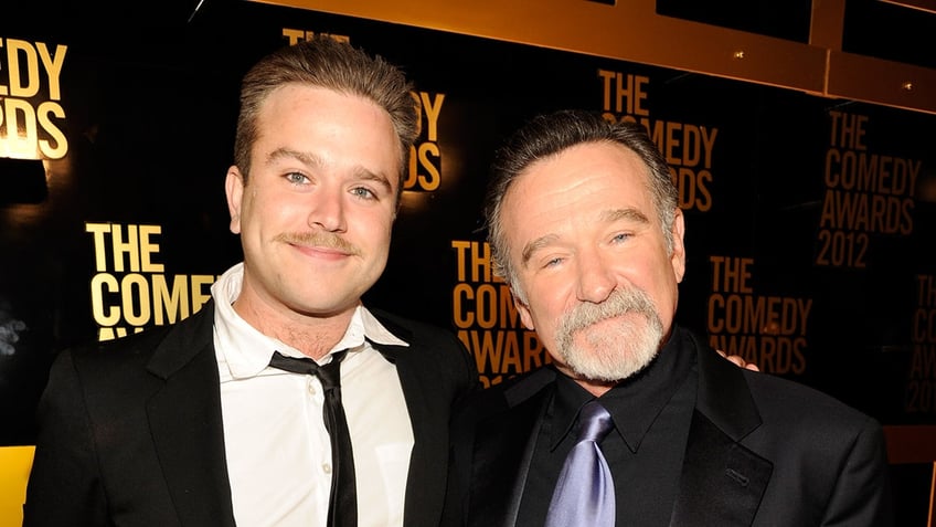 Zak Williams and Robin Williams posing together