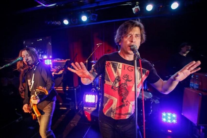 Aleksandr "Shura" Uman, left, and Yegor "Lyova" Bortnik perform during the Bi-2 rock band concert in Moscow, Russia, Thursday, Dec. 1, 2011. Members of a rock band that has been critical of Moscow’s war in Ukraine remain locked up in a Thai immigration jail, fearful that they could be deported …