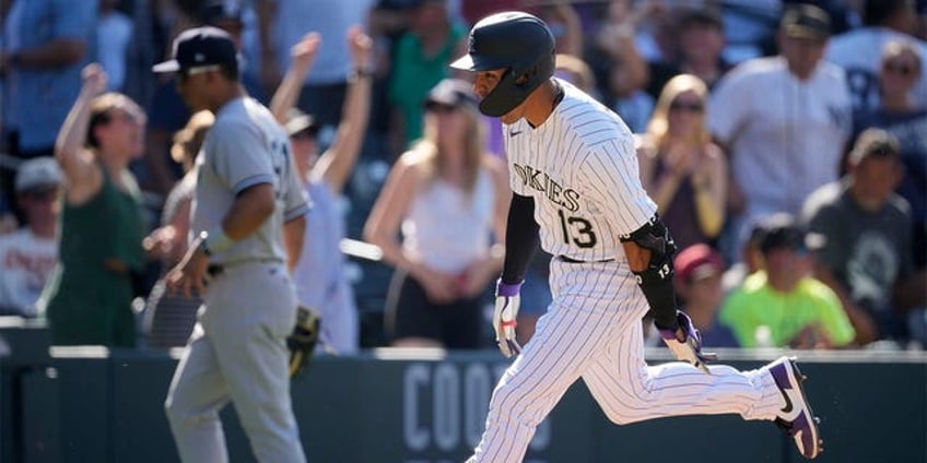 rockies walk off yankees on alan trejos first home run of the season in wild back and forth game