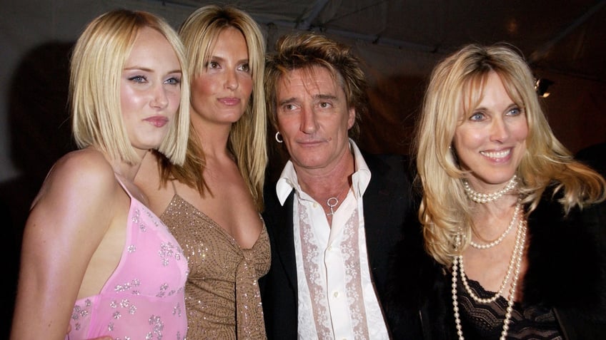 Rod Stewart poses with his daughter Kimberly, wife Penny and ex-wife Alana