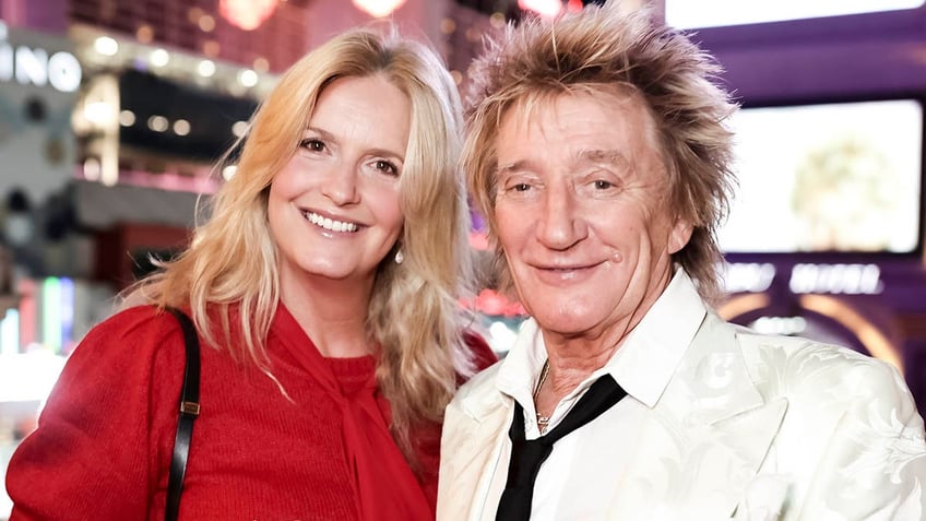 penny lancaster and rod stewart smiling