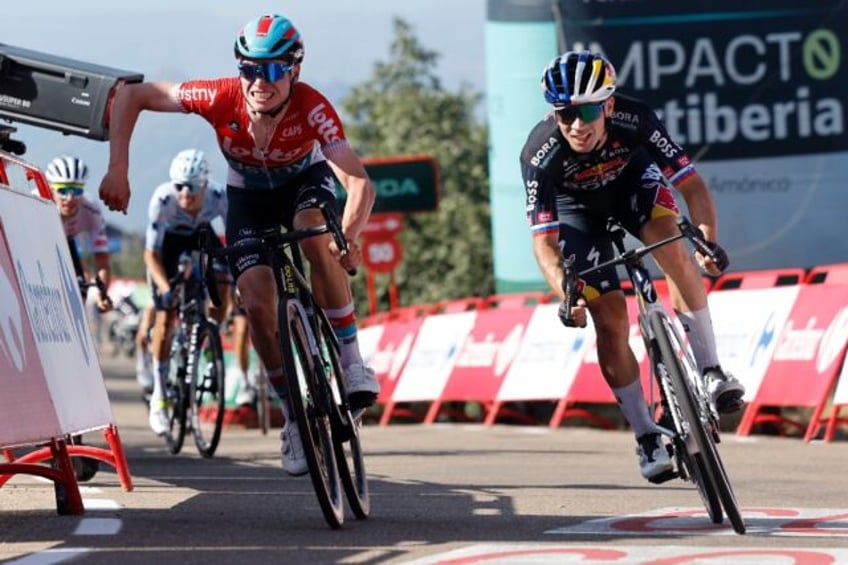 Primoz Roglic pips Lennert Van Eetvelt (left) to the line on stage four