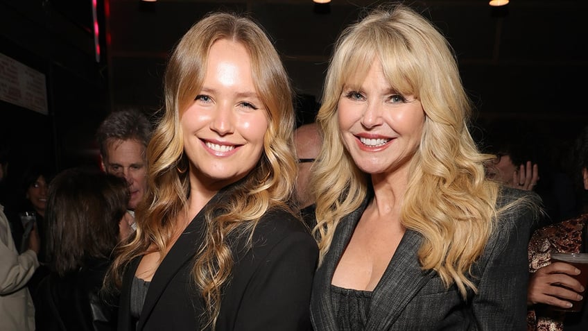 rolling stones fans christie brinkley and christy turlington hit concert with look alike daughters