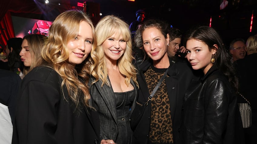 rolling stones fans christie brinkley and christy turlington hit concert with look alike daughters