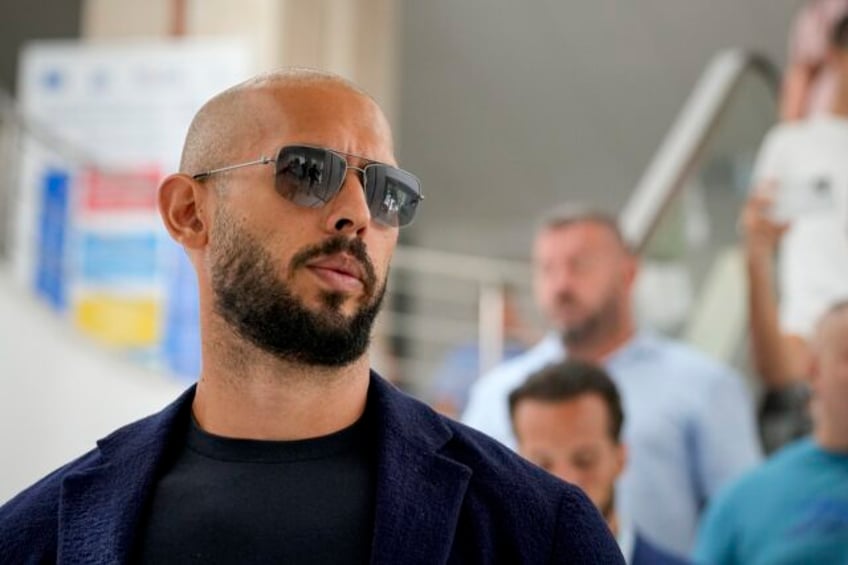 romanian court rules to keep andrew tate under house arrest as human trafficking case continues