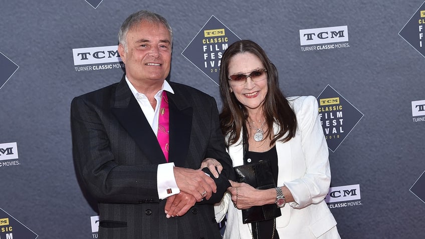 Leonard Whiting and Olivia Hussey posing together