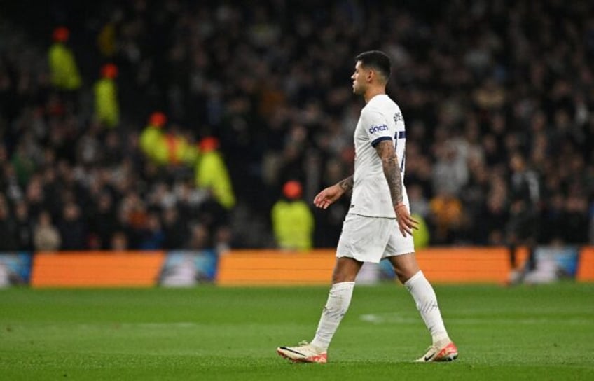 Under fire: Tottenham defender Cristian Romero leaves the pitch after being sent off at home to Chelsea in the Premier League on November 6