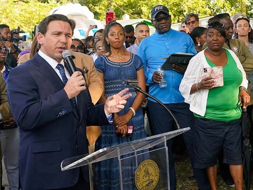 ron desantis booed at vigil for jacksonville shooting victims youre not welcome here