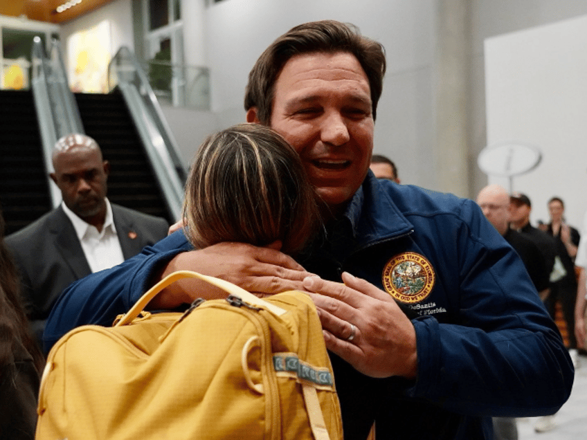 Ron DeSantis - hugs Israel airport rescue