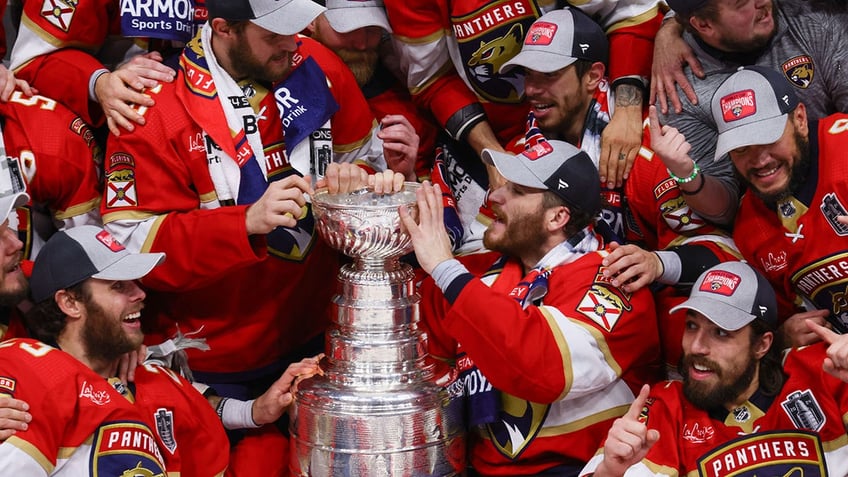 Panthers with cup