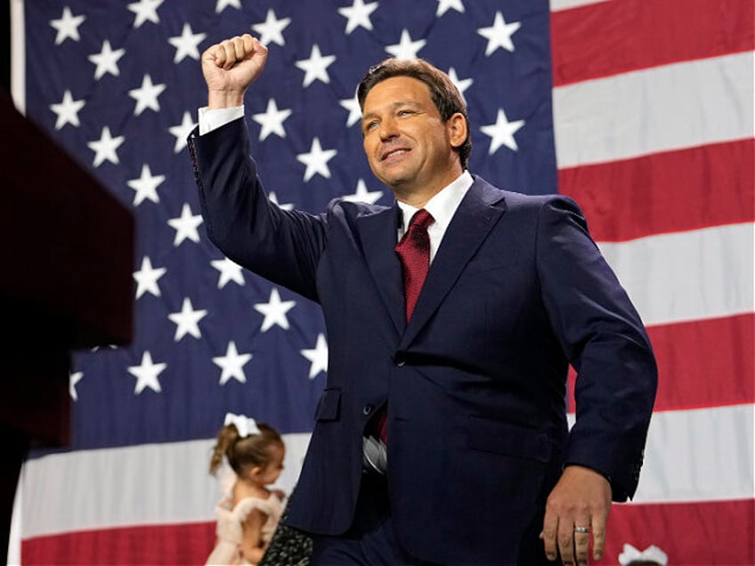 Incumbent Florida Republican Gov. Ron DeSantis arrives to speak to supporters at an electi