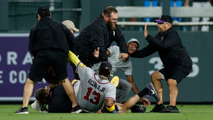 ronald acuna jr incident leads to two arrests police say