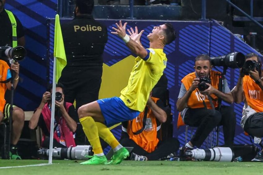 Cristiano Ronaldo celebrates scoring his second goal of the game