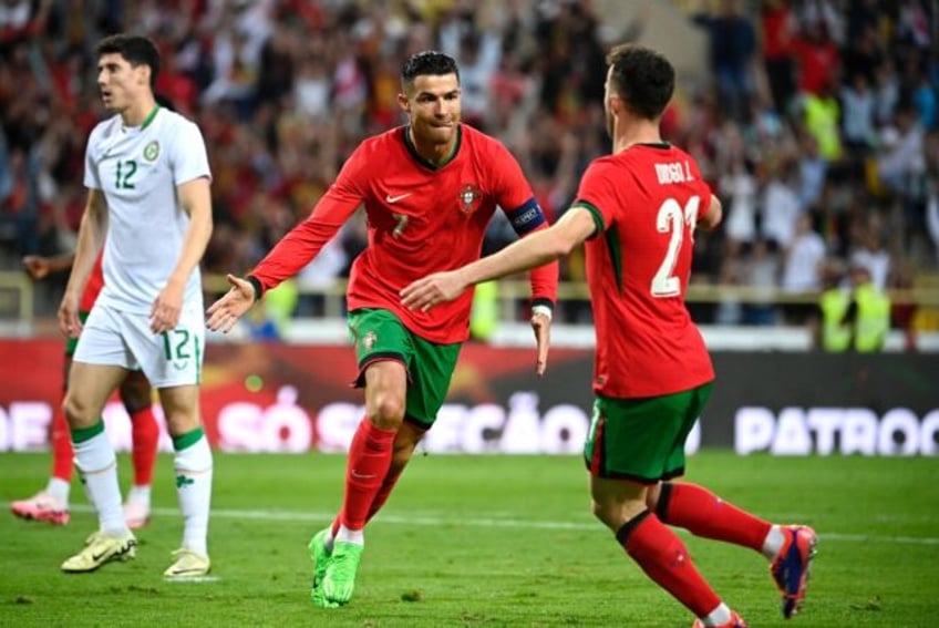 Cristiano Ronaldo (C) scored twice as Portugal beat Republic of Ireland in their final Eur