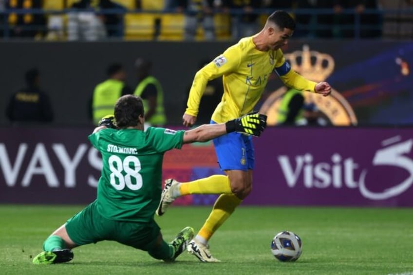 Cristiano Ronaldo scored late as Al Nassr swept into the Asian Champions League quarter-fi