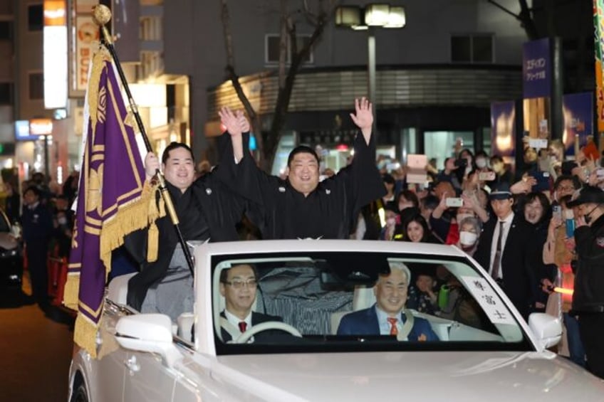 This photo taken on Sunday shows sumo wrestler Takerufuji after his victory in Osaka