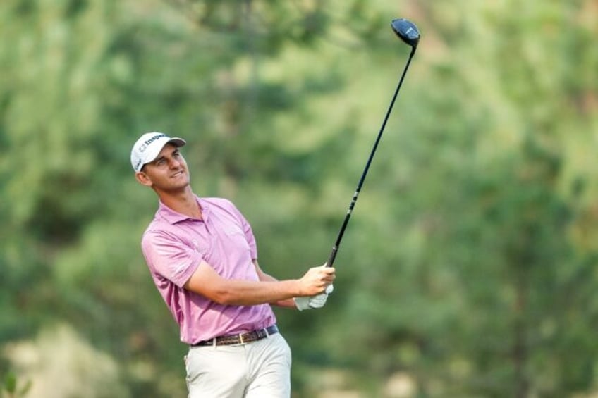 American Mac Meissner watches a tee shot on the way to the 36-hole lead in the US PGA Tour