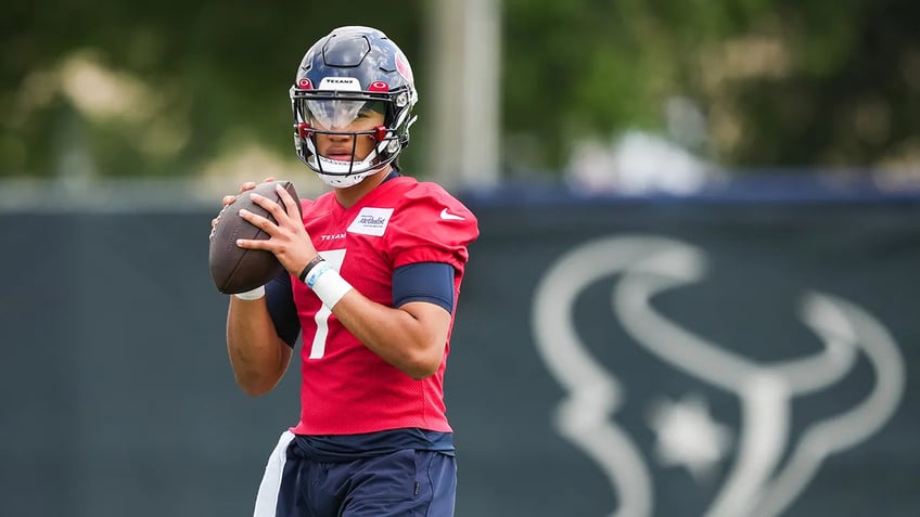 rookie qbs cj stroud anthony richardson both agree to fully guaranteed contracts on eve of training camp