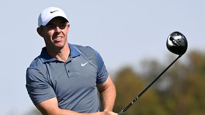 Rory McIlroy looks at golf shot