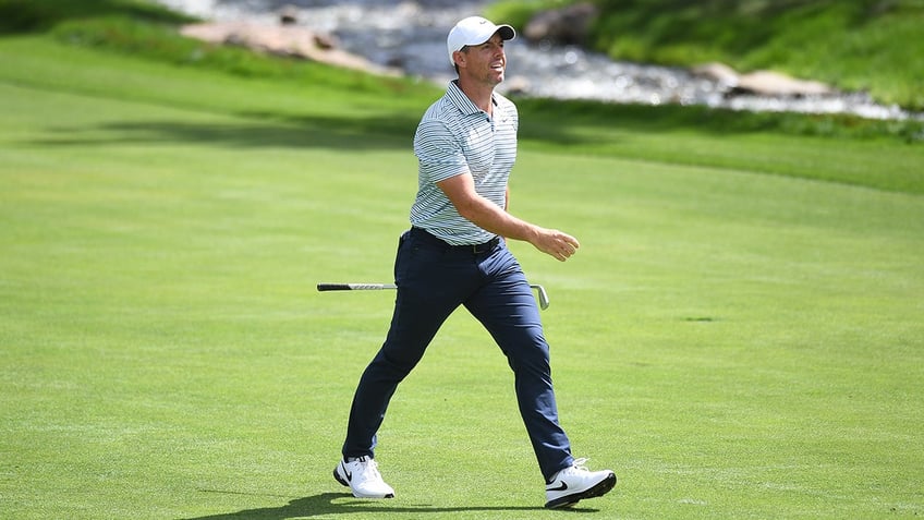 Rory McIlroy walks on course