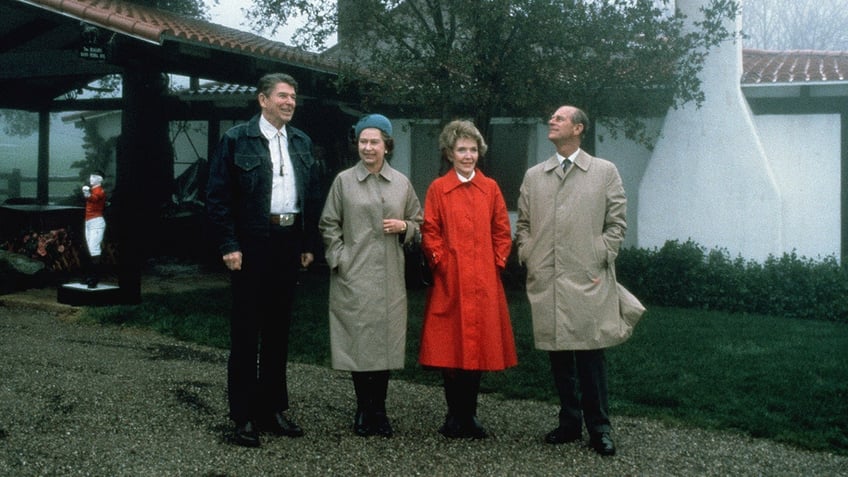 Queen Elizabeth II And Prince Philip pose with President Ronald Reagan And First Lady Nancy Reagan.